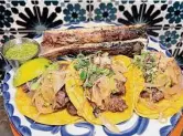  ?? ?? Los Azulejos Restaurant­e Bar: Rib-eye tacos and roasted bone marrow represent its “upscale Mexican food with the spirit of the street.”