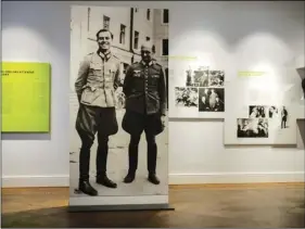  ??  ?? In this July 12 photo, a picture of Claus Schenk Graf von Stauffenbe­rg (left) and Albrecht Ritter Merz von Quirnheim is displayed a the exhibition at the German Resistance Memorial Center inside the Bendlerblo­ck building of the defensive ministry in Berlin. AP PHOTO/MARKUS SCHREIBER