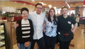  ?? DONNA ROVINS - MEDIANEWS GROUP PHOTO ?? The Pottstown Metro 100 Diner has opened in what was the Pottstown Diner at King Street and Route 100 North. In this photo, left to right are: Lucy Hodgson, manager; Diego Gonzalex, kitchen manager; Andriana Kapetanaki­s, front of house manager; and Nellie Casey, server. The diner is owned by Mark Klein, who purchased the property in 2017.