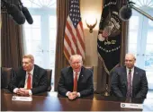  ?? Evan Vucci / Associated Press 2018 ?? President Trump speaks with steel and aluminum executives in March. Some Bay Area companies are seeking exemptions from tariffs on metal imports.