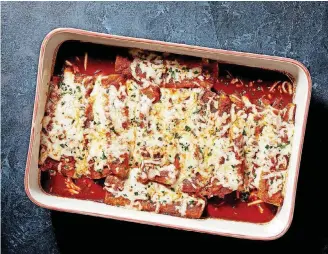  ?? [PHOTOS BY TOM MCCORKLE, FOR THE WASHINGTON POST] ?? Cheesy Chicken Enchiladas