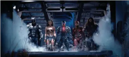  ?? WARNER BROS. PICTURES ?? The biggest heroes from DC Comics unite in “Justice League,” fighting the good fight in theaters Nov. 17.