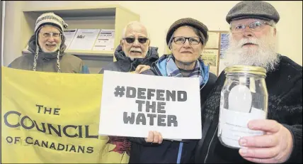  ?? LYNN CURWIN/TRURO DAILY NEWS ?? A sample of west coast water was delivered to MP Bill Casey’s office Friday by a group of people including, from left, Brian Gaulkie, Wilf Bean, Lydia Jenkinson and Paul Jenkinson. Deliveries were made to MPS’ offices across the country to bring...