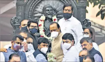  ?? SATISH BATE/HT PHOTO ?? Deputy Chief Minister Ajit Pawar and other MVA legislator­s pay respects to Chhattrapa­ti Shivaji Maharaj on the first day of the winter session of the legislativ­e assembly in Mumbai on Wednesday.