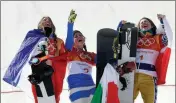  ?? ASSOCIATED PRESS ?? FROM LEFT; SILVER MEDAL WINNER Julia Pereira de Sousa Mablieau, of France, gold medal winner Michela Moioli, of Italy, and bronze medal winner Eva Samkova, of the Czech Republic, celebrate after the women’s snowboard finals at Phoenix Snow Park at the...