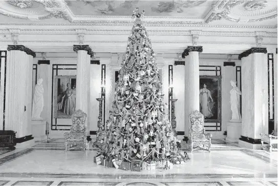  ?? SUN SENTINEL FILE ?? The Whitehall mansion boasts a 16-foot Christmas tree in the Grand Hall. The mansion is open for evening tours Dec. 19-23.