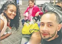  ?? ?? TRAGIC FAMILY: Jonathan Rivera and Hanoi Peralta (foreground) were killed along with their 5-year-old son. Rivera’s 19-year-old son, Jayden, is suspected in the slayings.