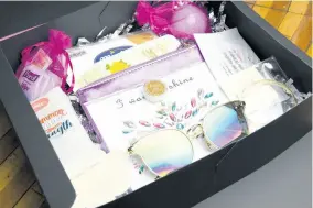  ??  ?? Each carnival glam box is filled with essentials for surviving before and after Jamaica’s carnival road march.