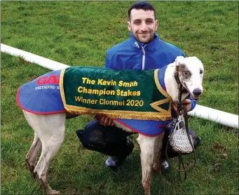  ?? Photo by Moss Joe Browne ?? A delighted handler and a proud Mitchels man Stephen Reidy from Tralee with Boylesport­s Magic after he won the Champion stakes at Clonmel.