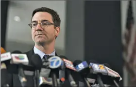  ?? AP/G-JUN YAM ?? The head of Chicago’s legal department, Edward Siskel, listens to a question during a news conference at the Dirksen Federal Courthouse on Monday.