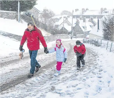  ??  ?? Kingussie fell under a blanket of snow yesterday. Picture: Katielee Arrowsmith.