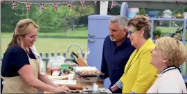  ??  ?? With Paul Hollywood, Prue Leith and Sandi Toksvig in the Bake Off tent