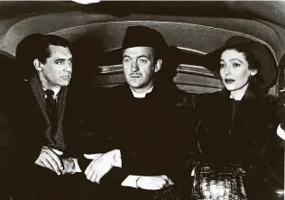  ?? RKO Pictures / Getty Images ?? Cary Grant, left, David Niven and Loretta Young star in the 1947 film “The Bishop’s Wife” today at 5 on TCM.