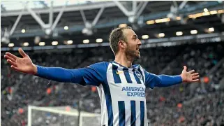  ?? GETTY IMAGES ?? Brighton and Hove Albion striker Glenn Murray celebrates after scoring a goal against West Ham in February before the Premier League season was halted.