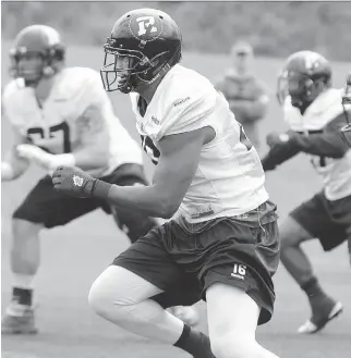  ?? JULIE OLIVER /OTTAWA CITIZEN ?? Wide receiver Marcus Henry Marcus Henry — at training camp on Tuesday — ranked first on the 2014 Redblacks in receptions (67) and receiving yards (824).