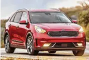 ??  ?? The Niro sports wide and low proportion­s with a long roofline and short overhangs that give it an overall athletic profile.