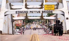  ?? Photograph: Dan Anderson/ ?? The funeral procession for the civil rights leader and Democratic representa­tive John Lewis crosses the Edmund Pettus Bridge in Selma, Alabama.