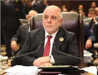  ?? AFP ?? Iraqi prime minister Haider Al Abadi says Shiite militias backed by Iran would remain an integral part of his country’s security apparatus