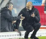  ??  ?? NO FAULT Guardiola, right, with Mourinho