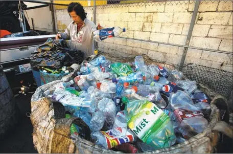  ?? Al Seib Los Angeles Times ?? RePLANET’s closure rippled down to the street level, as many turned to the firm’s centers to redeem deposit fees on containers.