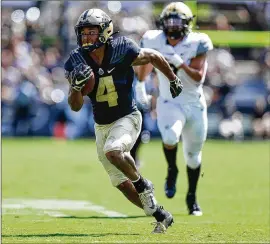  ?? MICHAEL CONROY/AP 2019 ?? Purdue wide receiver Rondale Moore was the 2017 Kentucky Gatorade player of the year after leading Louisville Trinity High to the state title. He’d committed to Texas but followed his high school coach to Purdue. He caught 114 passes as a freshman.