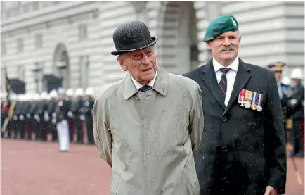  ?? PHOTO: REUTERS ?? Britain’s Prince Philip, in his role as Captain General, Royal Marines, attends a parade to mark the finale of the 1664 Global Challenge, on the Buckingham Palace Forecourt.