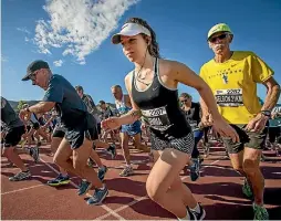  ?? LUZ ZUNIGA/STUFF ?? Gemma MacIntyre leads out Barry Dewar at the start of Sunday’s Nelson Half Festival of Running challenge.