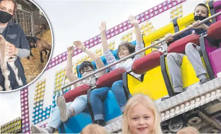  ?? Pictures: Chris Kidd ?? Eleanor Cooper, 7, of Hobart, (left) plays the laughing clowns at the Hobart Show.
Anna Shepheard, of Merseylea, and her Anglo Nubian goats (inset above).
Kids get a thrill on the Lethal Weapon ride (above). Kayley, 3, Tilly, 6, and Scully Shaw, 3, with their haul of showbags (right).