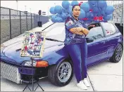  ?? CLEMENTE FAMILY ?? Margarita Clemente poses with the car her husband, Pedro Juan Clemente Verdejo, tricked out before he was slain in September 2016.