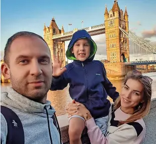  ?? ?? Jane Kazakova with her husband Dan and their son in London. Left, her son at a protest against the conflict in Ukraine