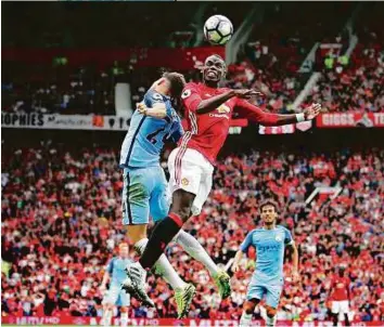  ?? Rex Features ?? Despite being deployed in the No. 10 role against Chelsea, Utd’s Pogba (right), who struggled in the holding role against City in the defeat in September, failed to create a single chance.