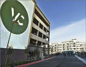  ?? Signal file photo ?? Local dignitarie­s gather for the ribbon-cutting ceremony for the Vista Canyon project’s parking lot in Canyon Country in this Oct. 27, 2020, Signal file photo. The Santa Clarita City Council approved funding for water factory operations for the project at Tuesday’s meeting.