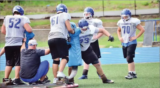  ?? PHOTOS BY WILLIAM HARVEY/RIVER VALLEY & OZARK EDITION ?? Greenbrier’s offensive linemen go through a blocking session during preason drills.