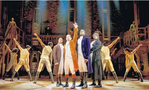  ?? JOAN MARCUS ?? Fergie L. Philippe (center, far right) stars as James Madison and Hercules Mulligan in the national tour of “Hamilton,” coming to Fort Lauderdale Dec. 18-Jan. 20. He is joined center stage by other cast members Elijah Malcomb (from left), Joseph Morales and Kyle Scatliffe.