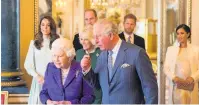  ??  ?? ● The Queen and Prince Charles at a Buckingham Palace event to mark the 50th anniversar­y of the Investitur­e, below