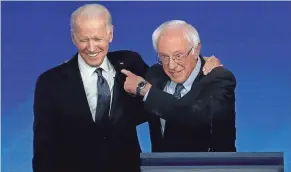  ?? ELISE AMENDOLA/AP FILE ?? Joe Biden, left, and Bernie Sanders will test their momentum Tuesday, when delegates in 14 states will be awarded.