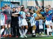  ??  ?? OVERJOYED: Huddersfie­ld manager David Wagner cel- ebrates with his players