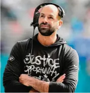  ?? Lynne Sladky/Associated Press ?? New York Jets head coach Robert Saleh looks up during the first half against the Miami Dolphins Sunday in Miami Gardens, Fla.