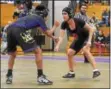  ?? PETE BANNAN — DIGITAL FIRST MEDIA ?? Upper Darby’s Sabbir Ahmed competes with Conestoga’s Nabaa Alazawee at 106 pounds Tuesday evening at Upper Darby. Ahmed won via pin.