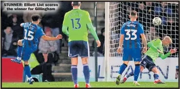  ??  ?? STUNNER: Elliott List scores the winner for Gillingham