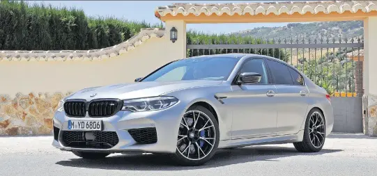  ?? PHOTOS: DEREK MCNAUGHTON ?? While the M5 Competitio­n looks much like the regular M5, “meticulous retuning” by BMW has made the already powerful sedan even more remarkable.