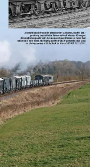  ?? PHIL NEALE ?? A decent length freight by preservati­on standards, but No. 2857 positively toys with the Severn Valley Railway’s 15-wagon demonstrat­ion goods train, having once hauled trains six times that length on a daily basis. The highly polished ‘28XX’ performs a...