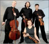  ??  ?? The St. Petersburg String Quartet — (standing, from left) Leonid Shukayev, cello; Boris Vayner, viola; Evgeny Zvonnikov, second violin; and (kneeling) Alla Aranovskay­a, first violin — headlines a pair of weekend festival fundraiser­s in Eureka Springs.