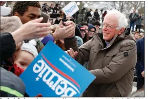  ?? (AP/George Frey) ?? Sen. Bernie Sanders greets his supporters Monday at a campaign event in Salt Lake City. Utah is one of the 14 states up for grabs on Super Tuesday.