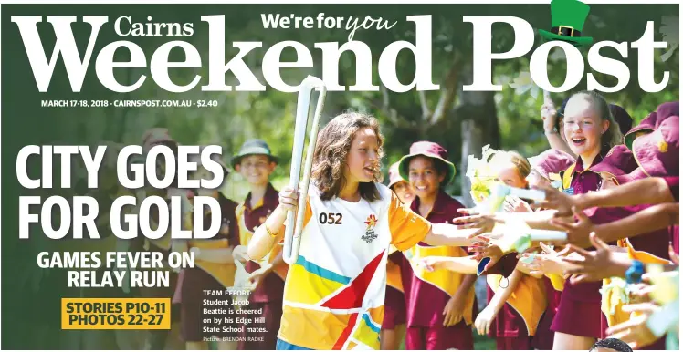  ??  ?? TEAM EFFORT: Student Jacob Beattie is cheered on by his Edge Hill State School mates. Picture: BRENDAN RADKE