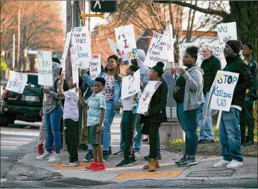  ?? BRANDEN CAMP / SPECIAL ?? Students and members of the community protest gun violence Friday in Atlanta.