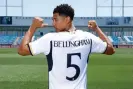  ?? Pedro Castillo/Real Madrid/Getty Images ?? Bellingham shows off his shirt number, chosen as an echo of history. Photograph: