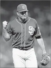  ?? JEFF ROBERSON / ASSOCIATED PRESS ?? San Diego reliever Joaquin Benoit pumps his fist after getting Cardinals second baseman Kolten Wong to fly out to end the eighth inning Friday in St. Louis. The Padres won 2-1.