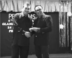  ??  ?? Idris (left) hands over the RM3,000 incentive to Jalot to cover the expenses for the Perfilems gala dinner.