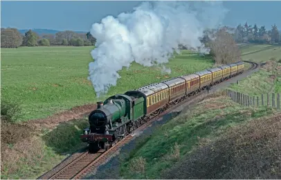  ?? JOHN TITLOW ?? The Severn Valley at its finest: No. 6960 Raveningha­m Hall heads up Eardington Bank on April 14.